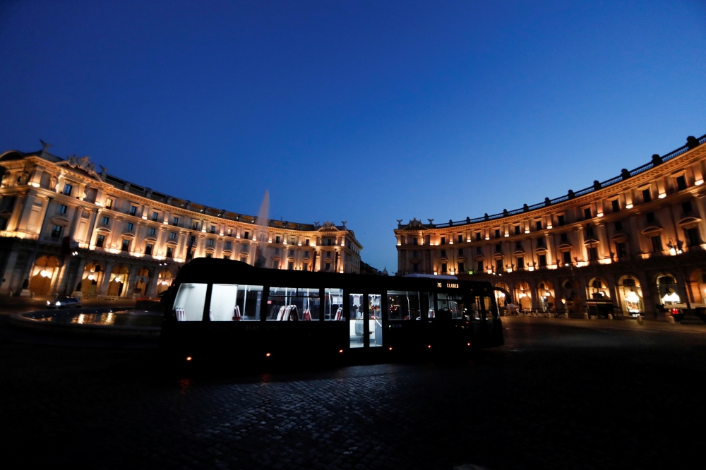 An empty bus is seen in Piazza della Repubblica, following the coronavirus disease (COVID-19) outbreak, in Rome, Italy, June 24, 2020. Picture taken June 24, 2020. REUTERS/Yara Nardi