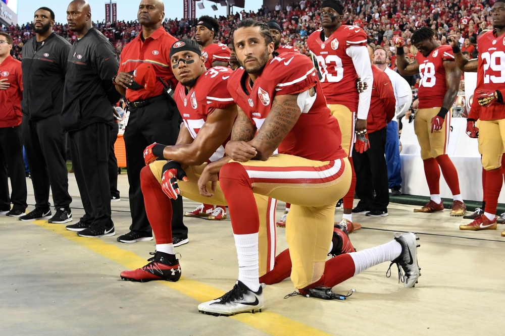  Former NFL star Colin Kaepernick, who launched kneeling protests during US national anthems to protest police brutality and racial injustice, will be the subject of a six-part series, Netflix announced June 29, 2020. / AFP / Thearon W. Henderson
