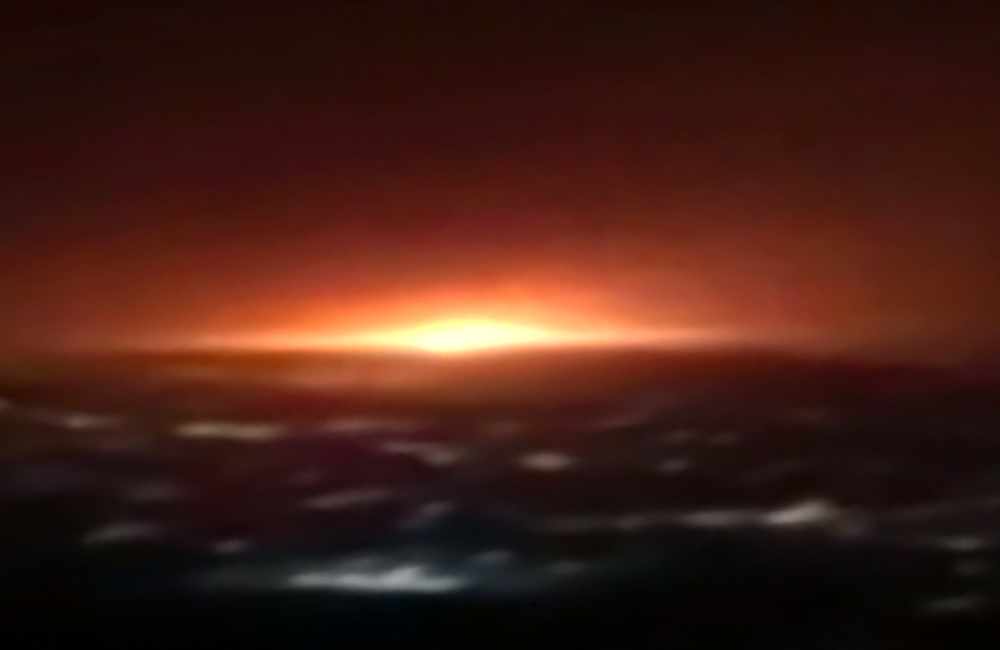 An image grab from footage obtained from Iranian State TV IRIB on June 26, 2020, shows an orange light, resulting from what the country's defence ministry said, the explosion of a gas tank in the Iranian capital Tehran./ AFP / IRIB TV /