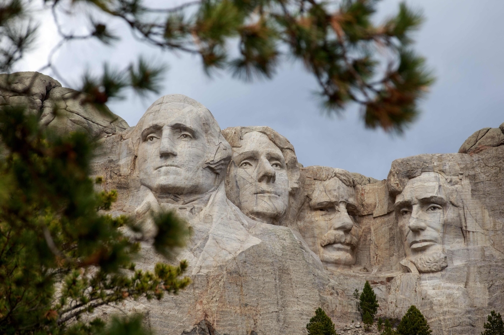 In this file photo taken on April 23, 2020 Mount Rushmore National Memorial on April 23, 2020, in Keystone, South Dakota. / AFP / Kerem Yucel
 