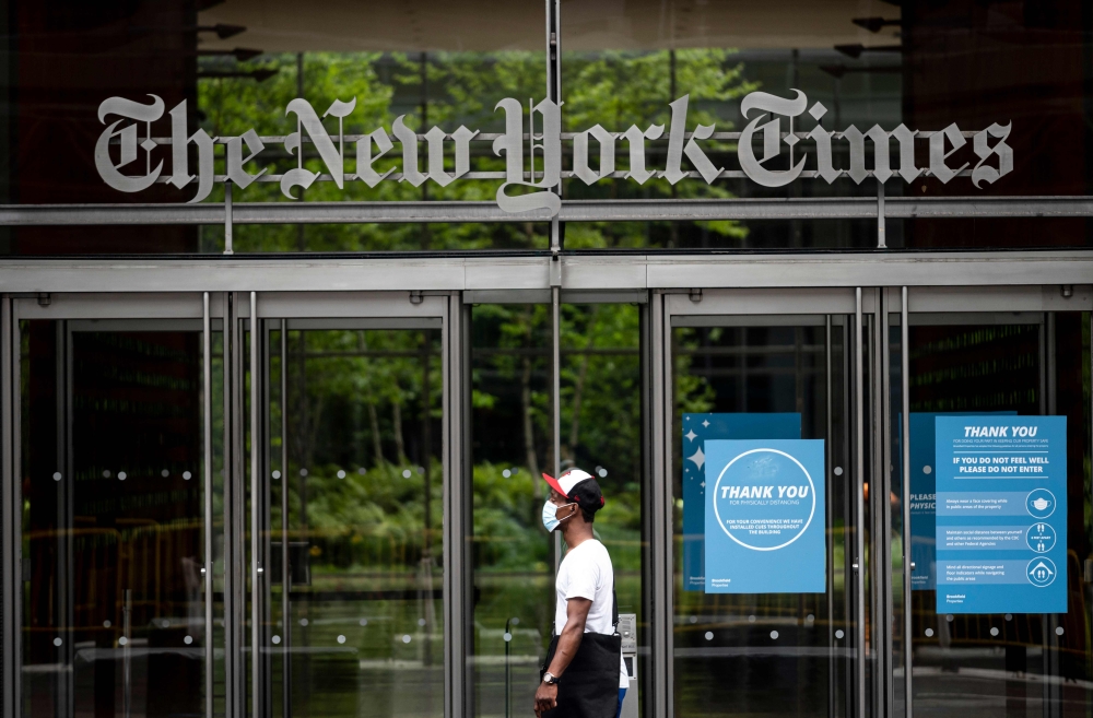The New York Times building is seen on June 30, 2020 in New York City. The New York Times has become the highest-profile media organization to leave Apple News, saying the tech giant's service was not helping achieve the newspaper's subscription and busin