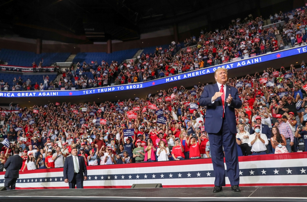(FILES) In this file photo taken on June 20, 2020, he upper section is seen partially empty as US President Donald Trump speaks during a campaign rally at the BOK Center in Tulsa, Oklahoma / AFP / Nicholas Kamm
