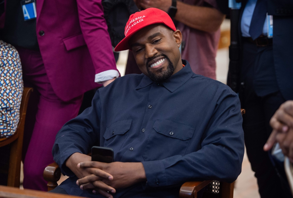 In this file photo rapper Kanye West speaks during his meeting with US President Donald Trump in the Oval Office of the White House in Washington, DC, on October 11, 2018. AFP / SAUL LOEB