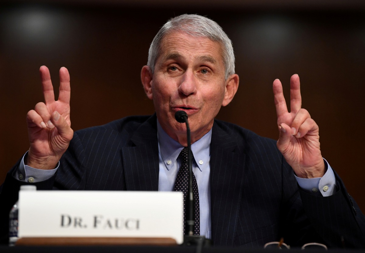 FILE PHOTO: Dr Anthony Fauci, director of the National Institute for Allergy and Infectious Diseases, testifies during a Senate Health, Education, Labor and Pensions (HELP) Committee hearing on Capitol Hill in Washington, U.S., June 30, 2020. Kevin Dietsc