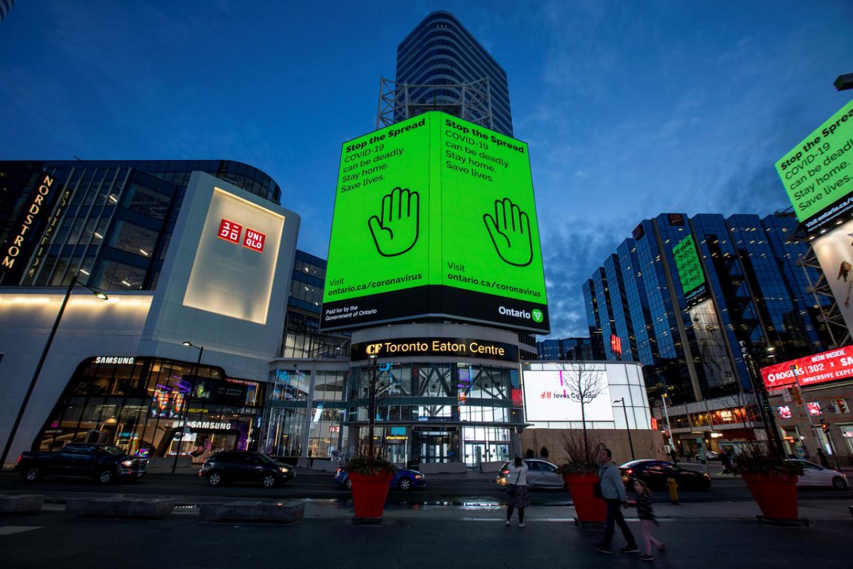 FILE PHOTO: A view of Yonge and Dundas Square, as the number of the coronavirus disease (COVID-19) cases continue to grow in Toronto, Ontario, Canada April 8, 2020. REUTERS/Carlos Osorio
