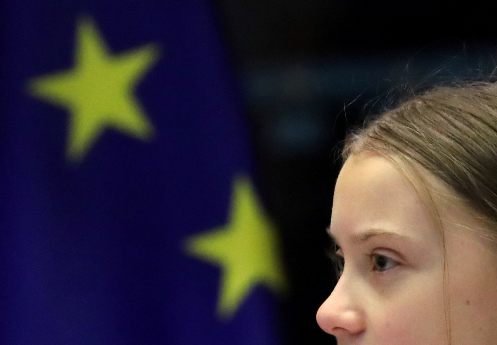 FILE PHOTO: Swedish climate activist Greta Thunberg addresses the environment committee at the European Parliament in Brussels, Belgium, March 4, 2020. REUTERS/Yves Herman/File Photo
