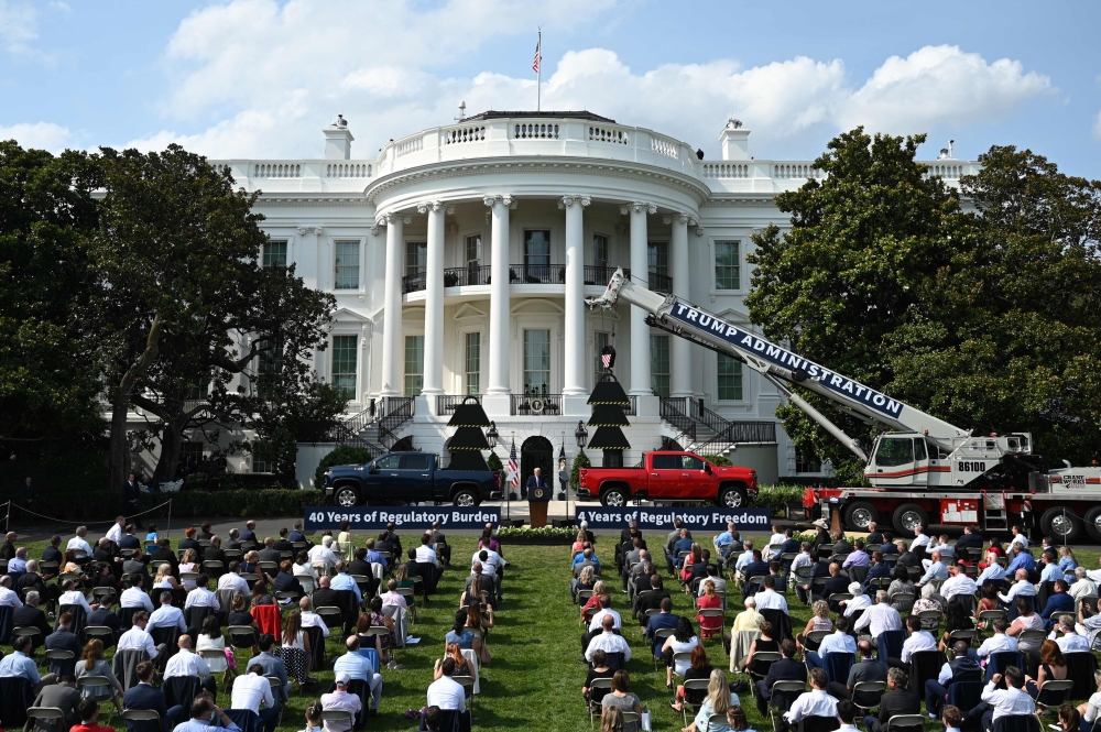 US President Donald Trump delivers remarks on Rolling Back Regulations to Help All Americans on the South Lawn at the White House on July 16, 2020 in Washington,DC. / AFP / JIM WATSON