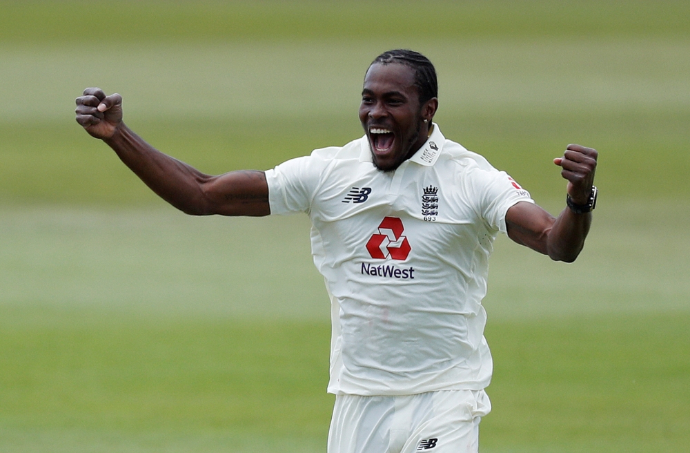 England's Jofra Archer celebrates taking the wicket of West Indies' Shamarh Brooks, as play resumes behind closed doors following the outbreak of the coronavirus disease (COVID-19) Adrian Dennis/Pool via REUTERS/File Photo