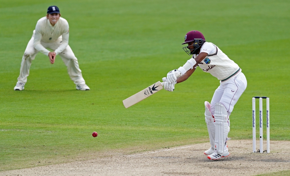 West Indies' Kraigg Brathwaite plays a shot on the fourth day of the second Test cricket match between England and the West Indies at Old Trafford in Manchester, northwest England on July 19, 2020. / AFP / POOL / Jon Super