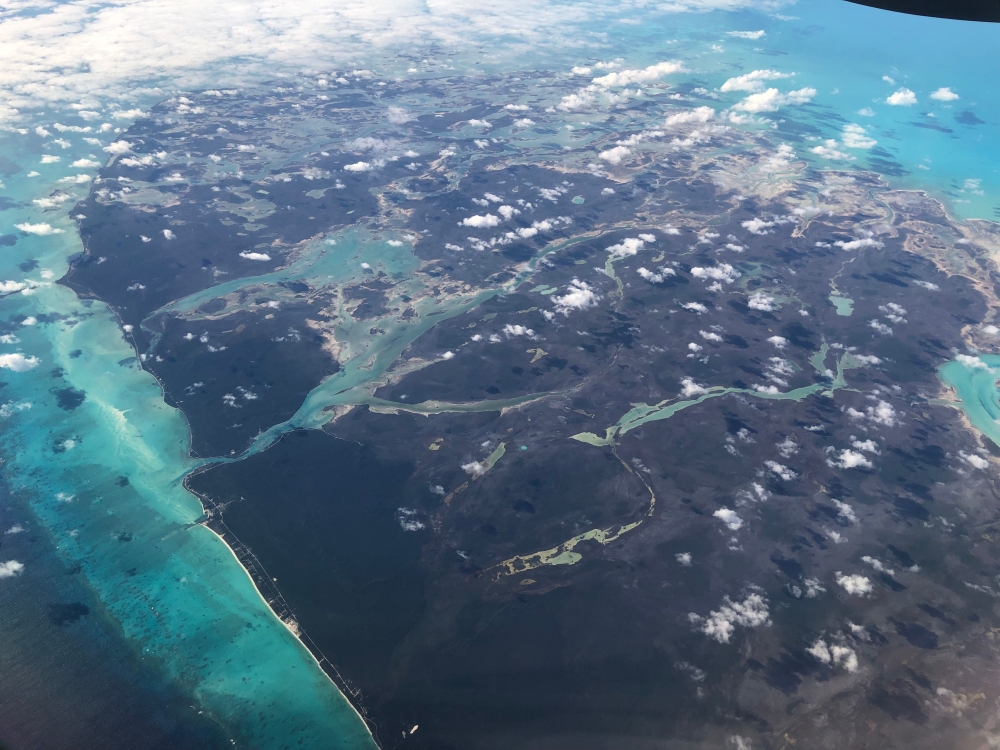 In this file photo taken on February 07, 2019 Aerial view of the Islands of the Bahamas. The Bahamas is barring visitors from the United States and Latin America in response to a rise in coronavirus cases in the archipelago three weeks after reopening its