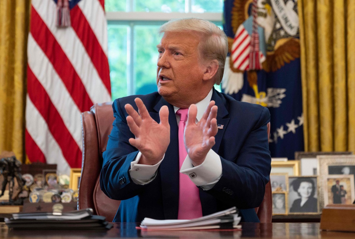 TOPSHOT - US President Donald Trump speaks at the White House in Washington, DC, on July 20, 2020. / AFP / JIM WATSON
