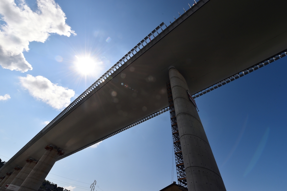A general view shows the Genoa bridge as engineers perform static testing operations ahead of its inauguration in Genoa, Italy, July 19, 2020. REUTERS/Massimo Pinca/File Photo