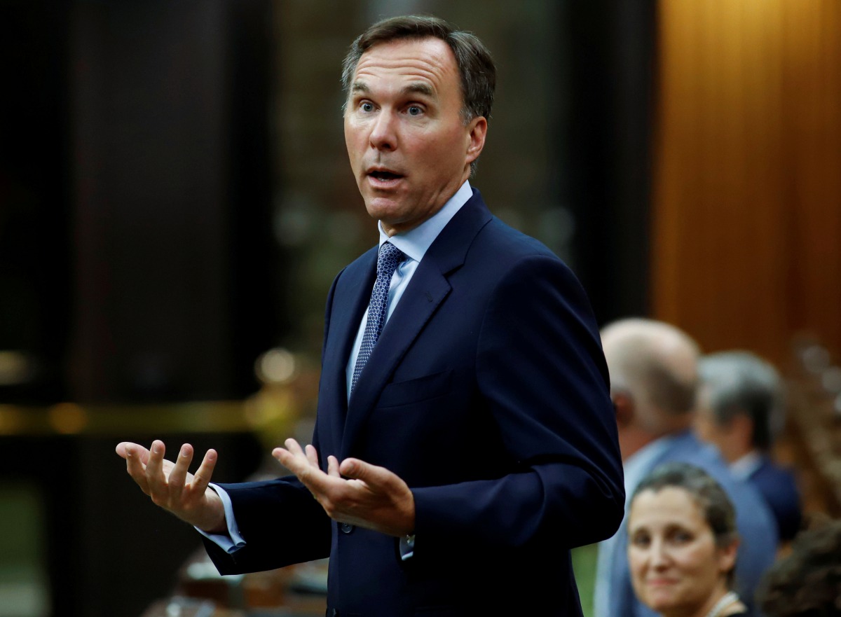 FILE PHOTO: Canada's Minister of Finance Bill Morneau answers a question in the House of Commons on Parliament Hill in Ottawa, Ontario, Canada July 8, 2020. REUTERS/Patrick Doyle/File Photo
