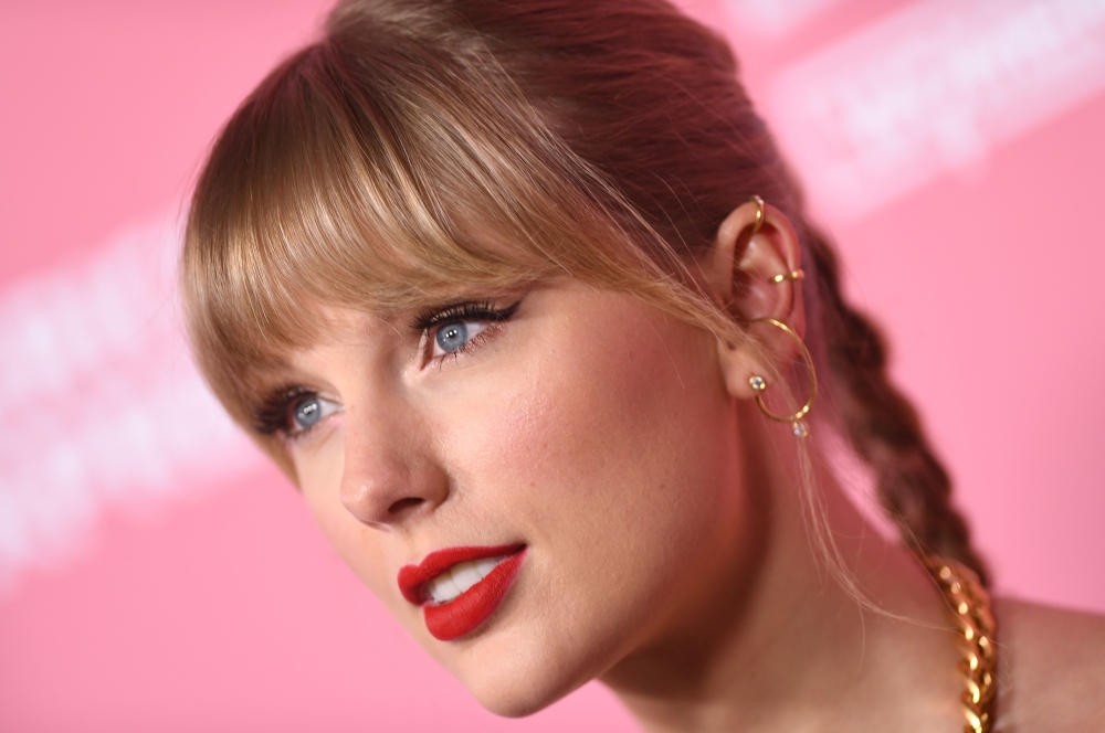 In this file photo taken on December 12, 2019, US singer/songwriter Taylor Swift arrives for Billboard's 2019 Woman of the Year at the Holllywood Palladium in Los Angeles. Swift delighted fans by announcing on social media that she would release a surpris