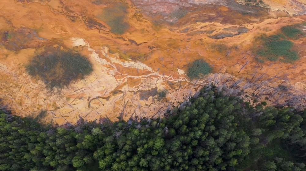 An aerial view shows an acid spill in an area around the Levikhinsky mine in Sverdlovsk region, Russia, July 17, 2020, in this still image taken from video. REUTERS TV/via REUTERS