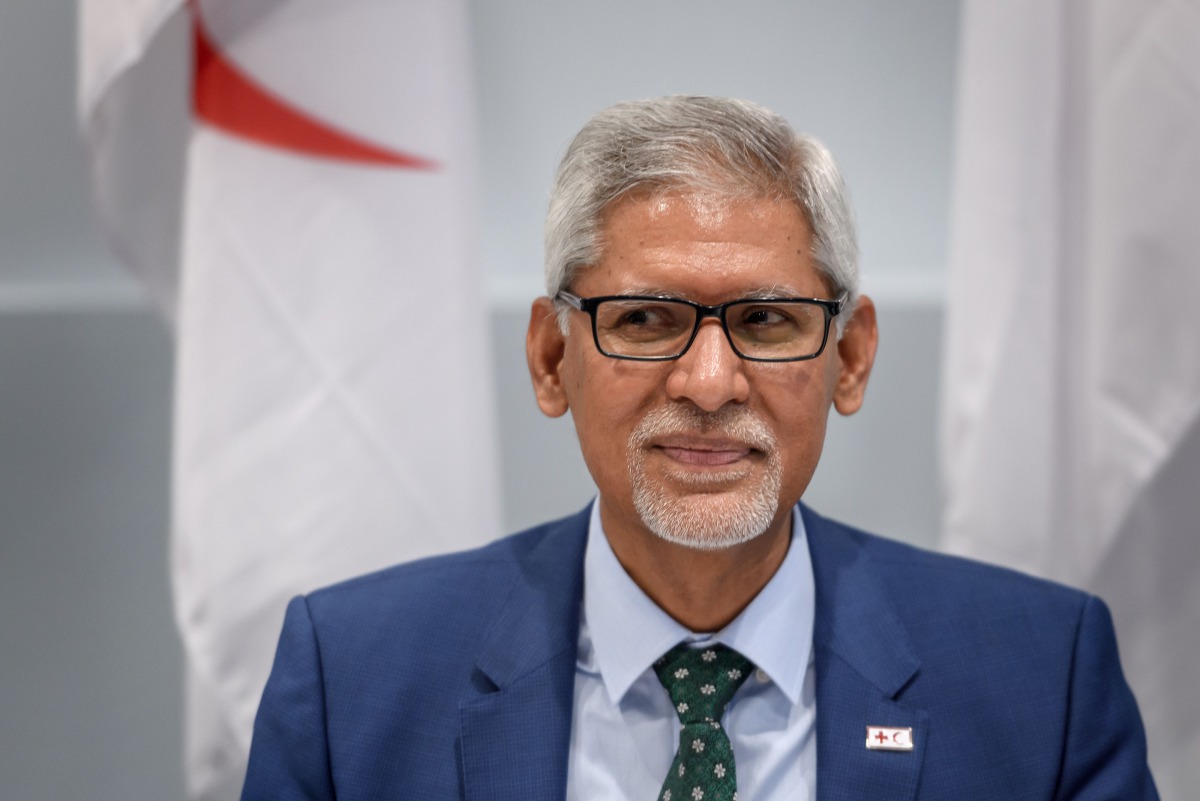 International Federation of Red Cross and Red Crescent Societies (IFRC) Secretary General Jagan Chapagain attends a signing ceremony after the International Automobile Federation (FIA) delivered a nearly 2 million euros cheque to the IFRC to support the h