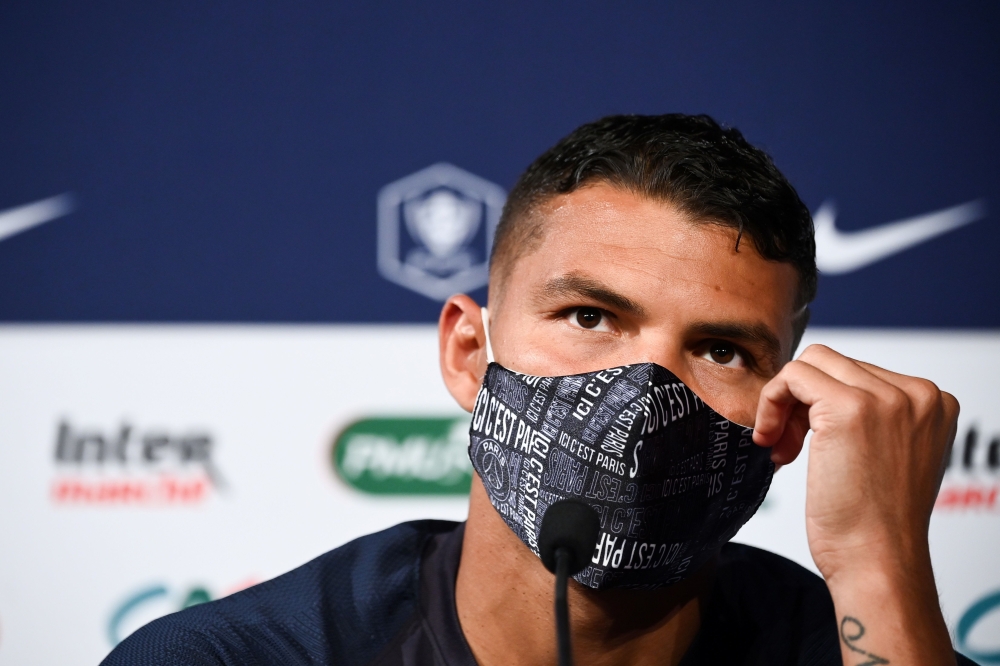 Paris Saint-Germain's Brazilian defender Thiago Silva wears a protective facemask as he speaks during a press conference at the Stade de France stadium, in Saint-Denis, on the outskirts of Paris, on July 23, 2020 on the eve of the French Cup final between