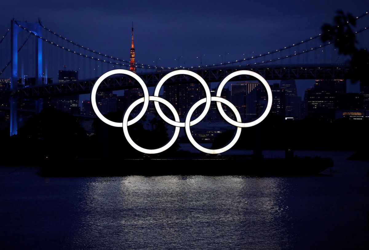 FILE PHOTO: The giant Olympic rings are pictured two days before the start of the one-year countdown to the Tokyo Olympics that have been postponed to 2021 due to the coronavirus disease (COVID-19) outbreak, at the waterfront area at Odaiba Marine Park in
