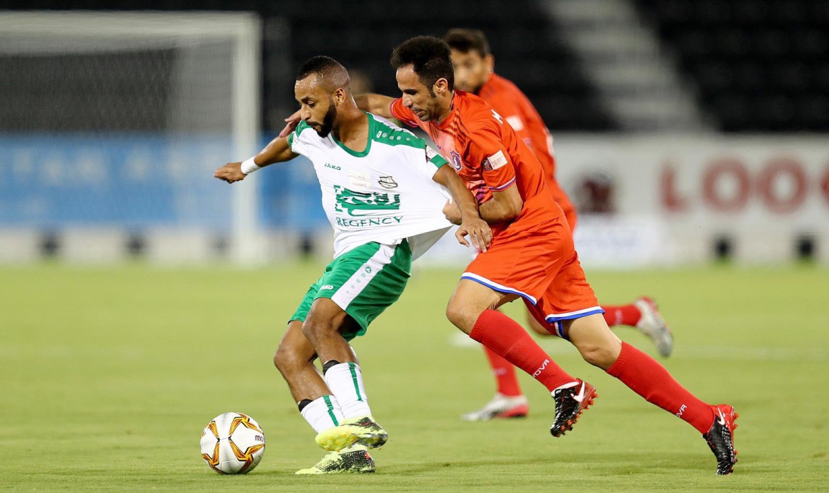 Players vie for the ball during the QNB Stars Legague match between Al Shahania and Al Ahli at Al Sadd Stadium yesterday.