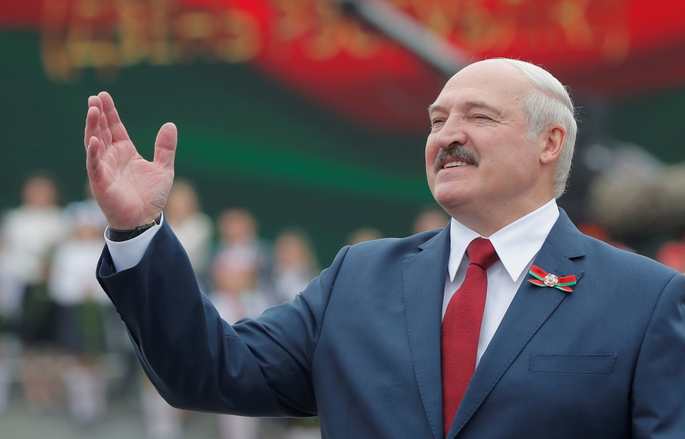FILE PHOTO: Belarusian President Alexander Lukashenko gestures as he takes part in the celebrations of Independence Day in Minsk, Belarus July 3, 2020. REUTERS/Vasily Fedosenko -/File Photo