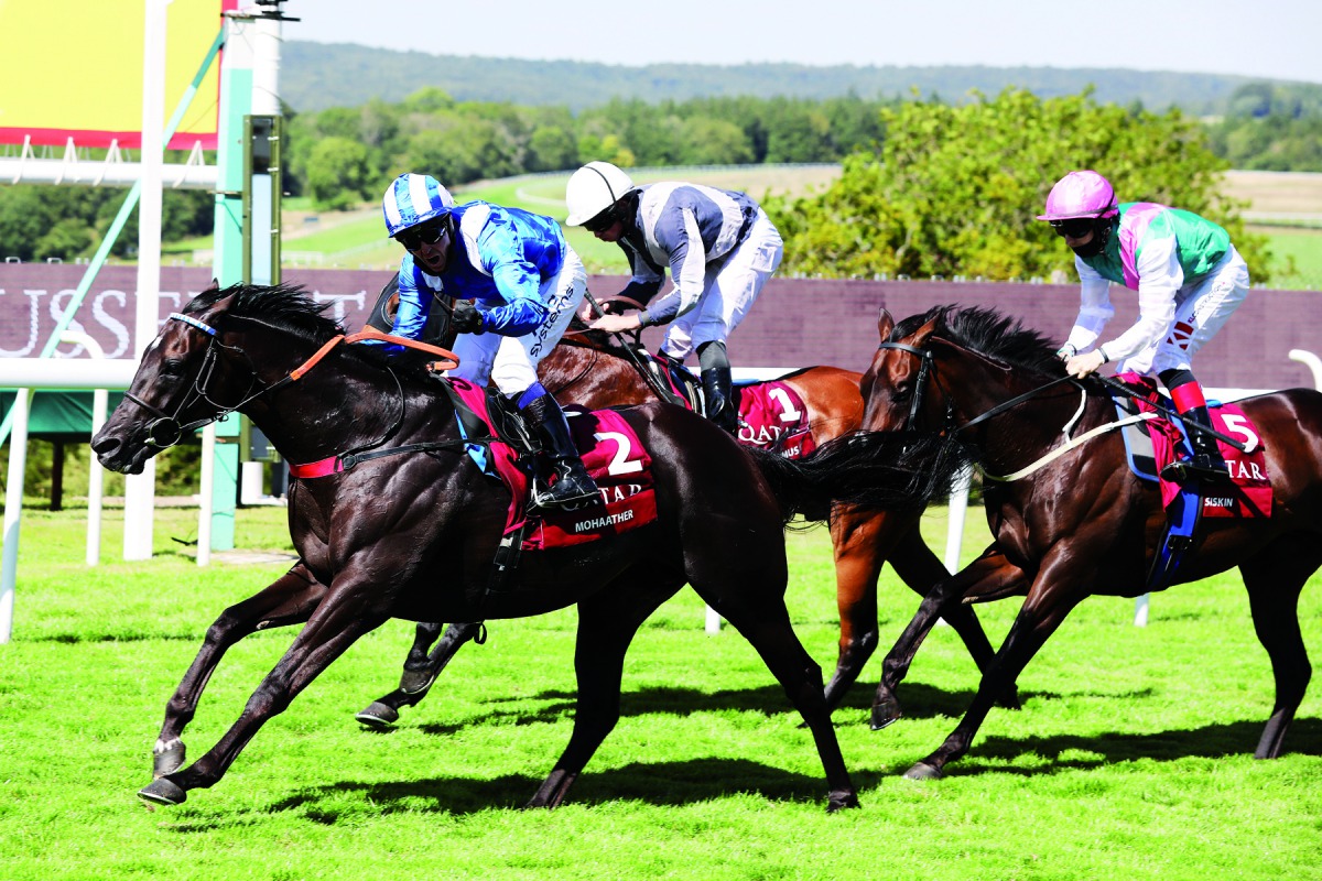 Jockey Jim Crowley riding Mohaather (front) celebrates after winning the coveted Gr1 Qatar Sussex Stakes on second day of Qatar Goodwood Festival yesterday.  