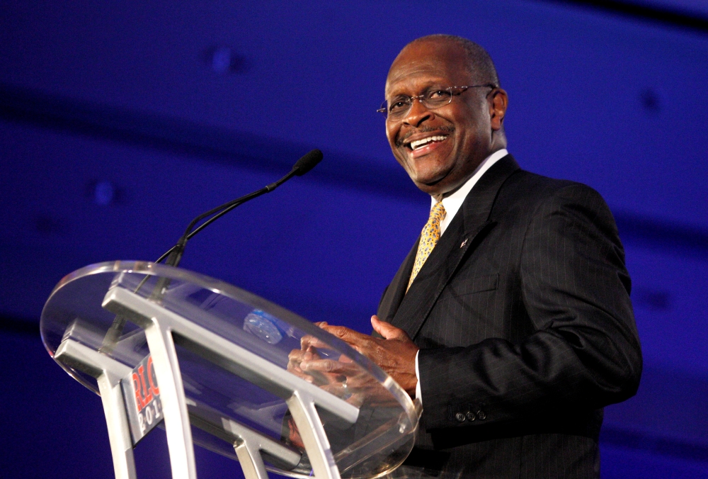 FILE PHOTO: Republican presidential hopeful Herman Cain speaks during the Republican Leadership Conference in New Orleans, Louisiana, U.S., June 17, 2011. REUTERS/Sean Gardner/File Photo
