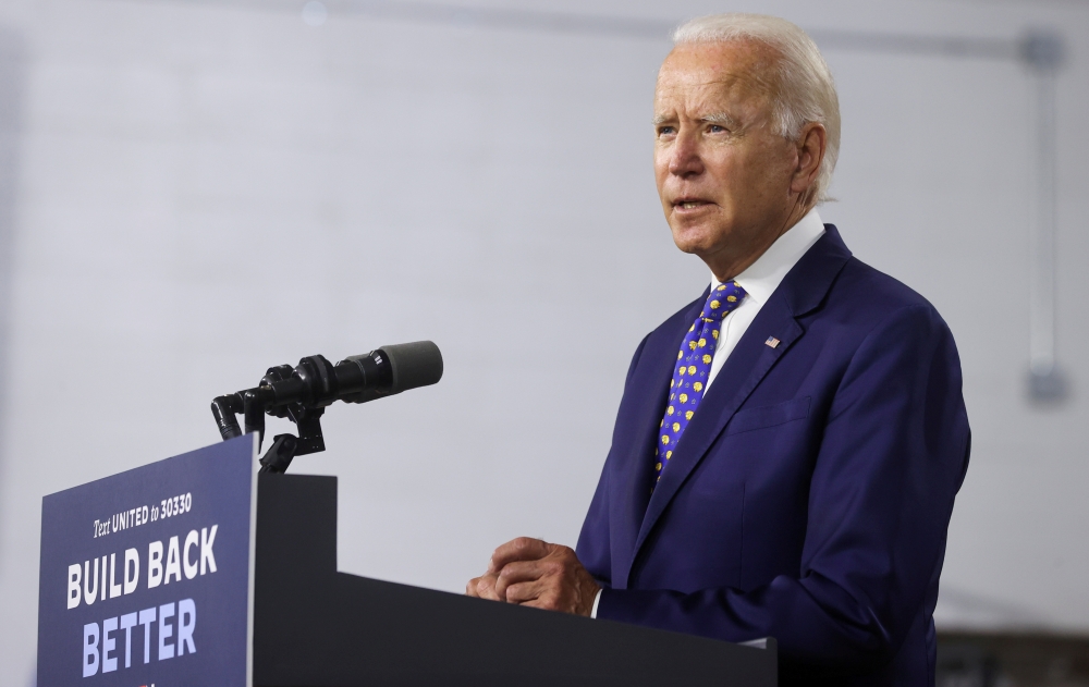 FILE PHOTO: Democratic presidential candidate and former Vice President Joe Biden speaks about his plans to combat racial inequality at a campaign event in Wilmington, Delaware, U.S., July 28, 2020. REUTERS/Jonathan Ernst
