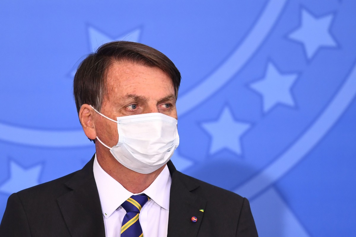 Brazilian President Jair Bolsonaro attends the launch of the Rural Women's Rights program at Planalto Palace in Brasilia, on July 29, 2020. This is the first public appearance of Bolsonaro in an official event after he tested negative for COVID-19 coronav