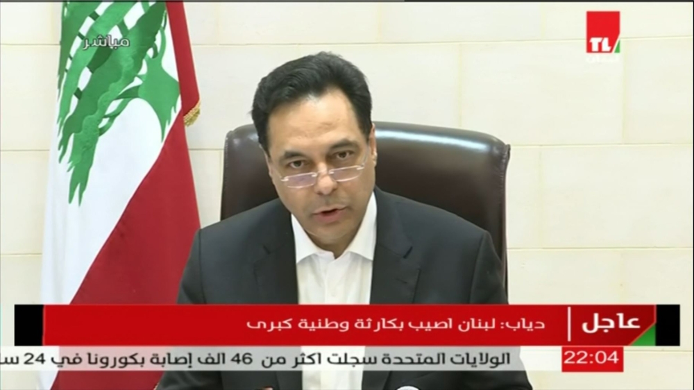 An image grab from footage obtained from Lebanese public television network Tele Liban on August 4, 2020 shows 's Prime Minister Hassan Diab speaking in the capital Beirut following two massive blasts that rocked the port of Beirut. Lebanon's prime minist