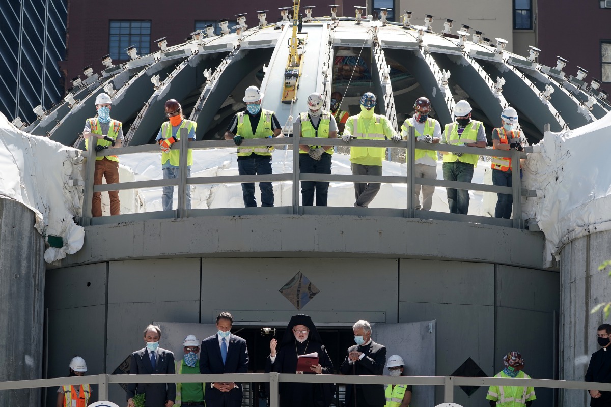 Andrew Cuomo, Governor of New York State, bows his head in prayer at the St. Nicolas National Shrine during an event to mark the roof going onto the building in the Manhattan borough of New York City, New York, U.S., August 3, 2020. REUTERS/Carlo Allegri