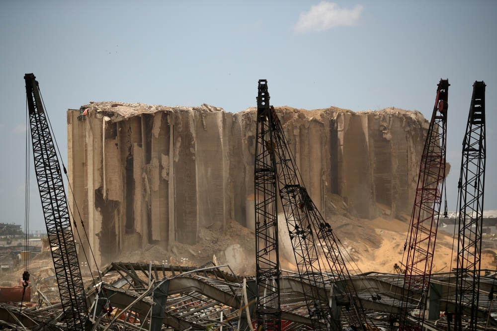 Debris are seen in the port area after a blast in Beirut, Lebanon, August 10, 2020. REUTERS/Hannah McKay/File Photo