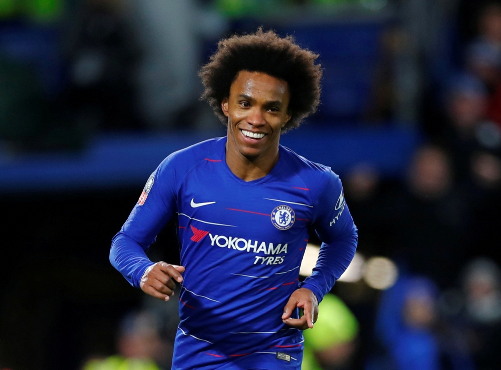 FILE PHOTO: Soccer Football - FA Cup Fourth Round - Chelsea v Sheffield Wednesday - Stamford Bridge, London, Britain - January 27, 2019 Chelsea's Willian celebrates scoring their third goal REUTERS/Eddie Keogh/File Photo