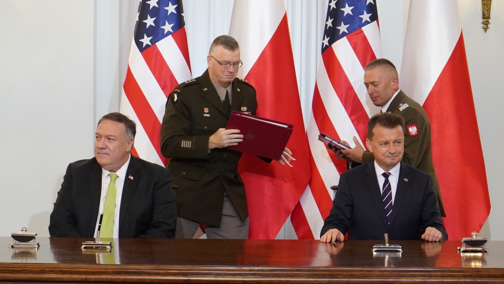 US Secretary of State Mike Pompeo and Poland's Minister of Defence Mariusz Blaszczak sign the US-Poland Enhanced Defence Cooperation Agreement in the Presidential Palace in Warsaw, Poland August 15, 2020. Janek Skarzynski/Pool via REUTERS