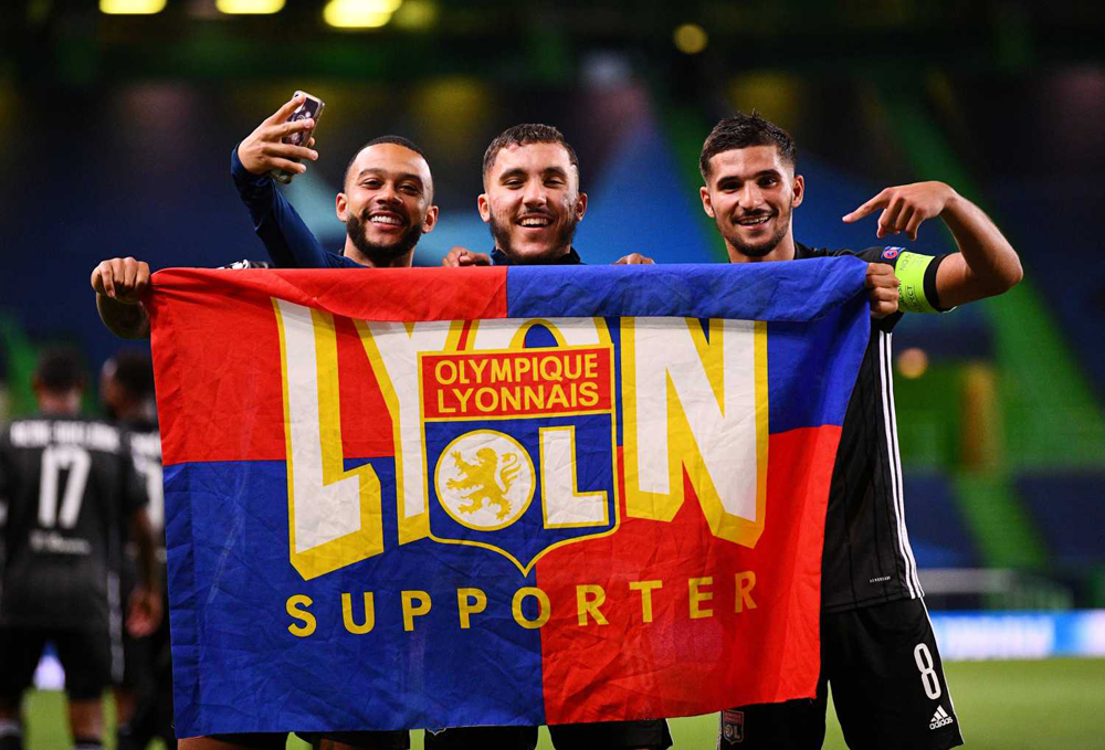 Olympique Lyonnais players celebrating after defeating Manchester City to reach the Champions League semi-finals.