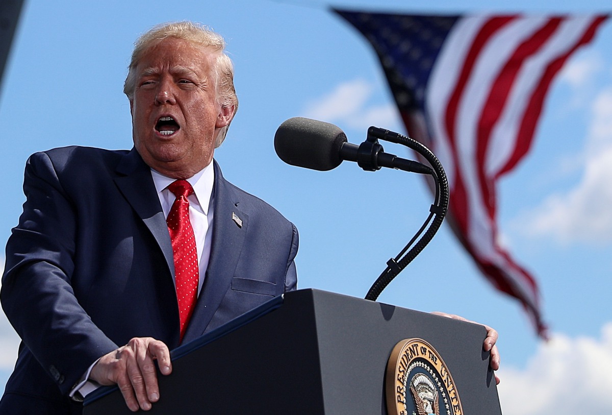 U.S. President Donald Trump arrives to deliver a campaign speech at Mankato Regional Airport in Mankato, Minnesota, U.S., August 17, 2020. REUTERS/Tom Brenner TPX IMAGES OF THE DAY
