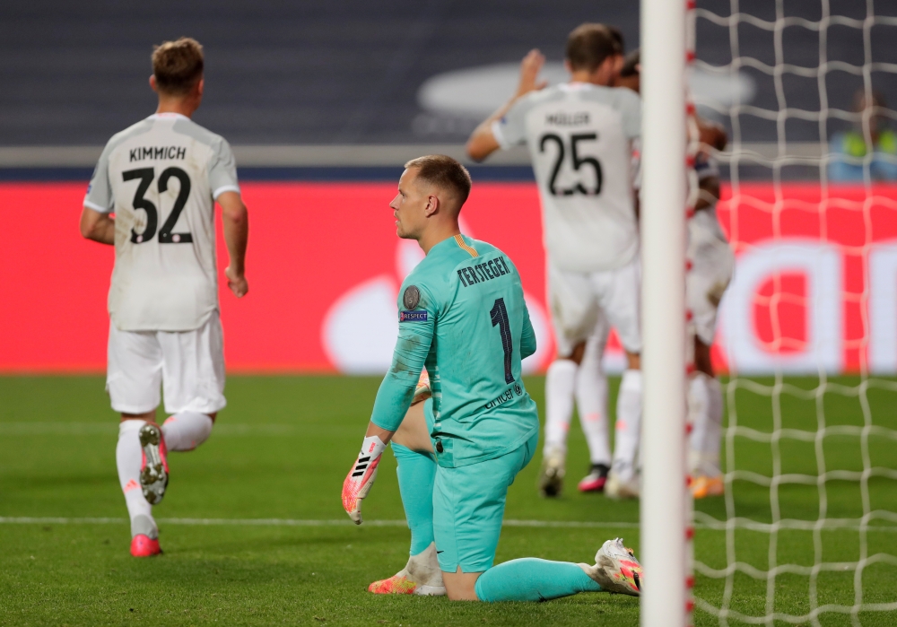 August 14, 2020 Barcelona's Marc-Andre ter Stegen looks dejected after Bayern Munich's Philippe Coutinho scored their eighth goal, as play resumes behind closed doors following the outbreak of the coronavirus disease (COVID-19) Manu Fernandez/Pool via REU