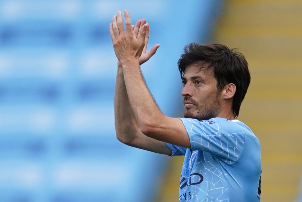 July 26, 2020 Manchester City's David Silva is replaced in his last match with Manchester City, as play resumes behind closed doors following the outbreak of the coronavirus disease (COVID-19) Pool via REUTERS/Dave Thompson