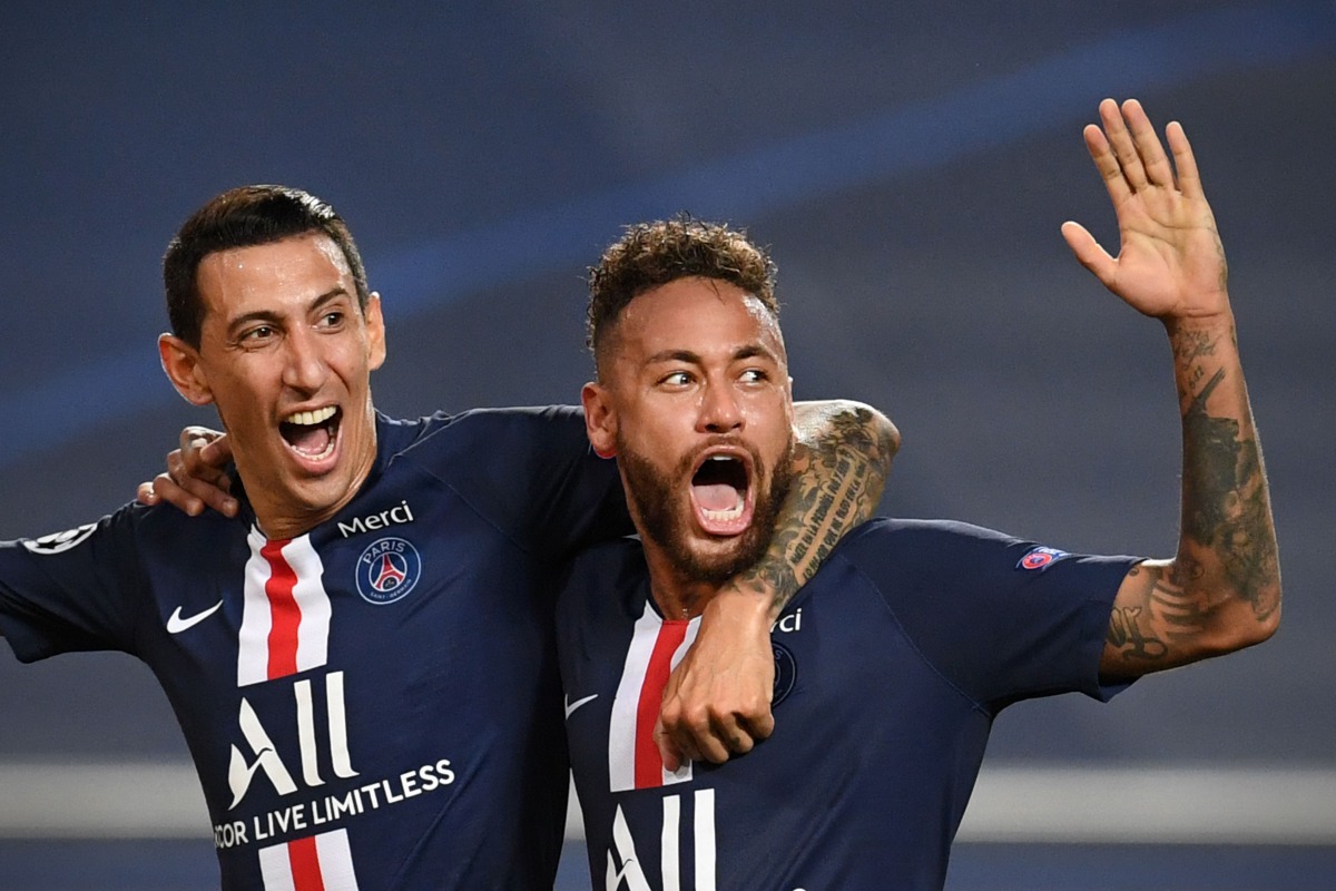 Paris Saint-Germain's Argentine midfielder Angel Di Maria (L) celebrates with Paris Saint-Germain's Brazilian forward Neymar after scoring his team's second goalduring the UEFA Champions League semi-final football match between Leipzig and Paris Saint-Ger