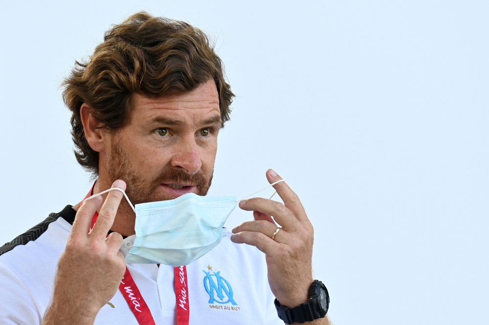 July 31, 2020 Olympique Marseille coach Andre Villas Boas wearing a protective face mask before the match, following the resumption of play behind closed doors after the outbreak of the coronavirus disease (COVID-19) Christof Stache/Pool via REUTERS/File 