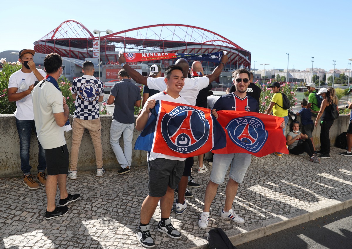 Soccer Football - Champions League - Final - Bayern Munich v Paris St Germain - Estadio da Luz, Lisbon, Portugal - August 23, 2020 Paris St Germain fans outside the stadium before the match, as play resumes behind closed doors following the outbreak of th