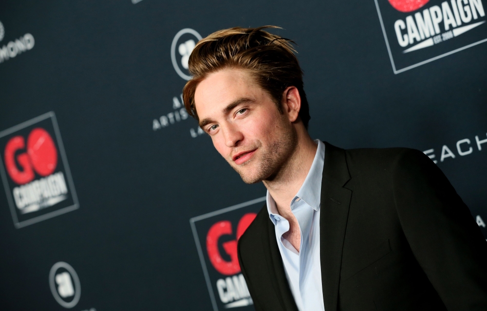 In this file photo taken on November 15, 2019 Robert Pattinson attends the Go Campaign's 13th Annual Go Gala at NeueHouse Hollywood on November 16, 2019 in Los Angeles, California. Robert Pattinson showcased 
