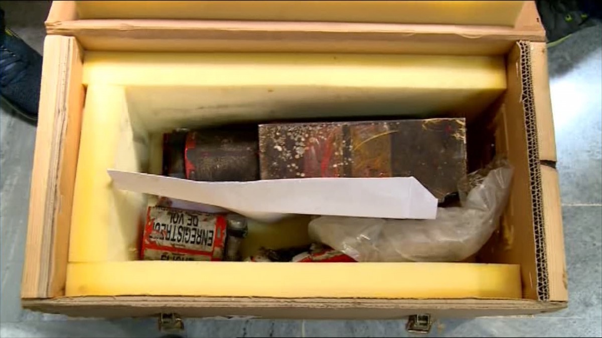 This file image grab from footage obtained from the state-run Iran Press news agency on January 10, 2020 shows what Iran's civil aviation says is the black box of the Ukrainian airline flight that crashed near Tehran killing all 176 on board. AFP PHOTO / 