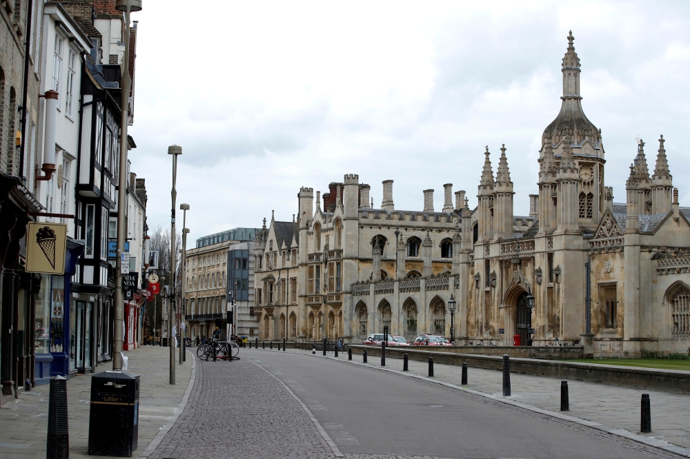 An almost empty street is seen outside Cambridge University, as the spread of the coronavirus disease (COVID-19) continues, Cambridge, Britain, April 1, 2020. REUTERS/Andrew Couldridge/File Photo