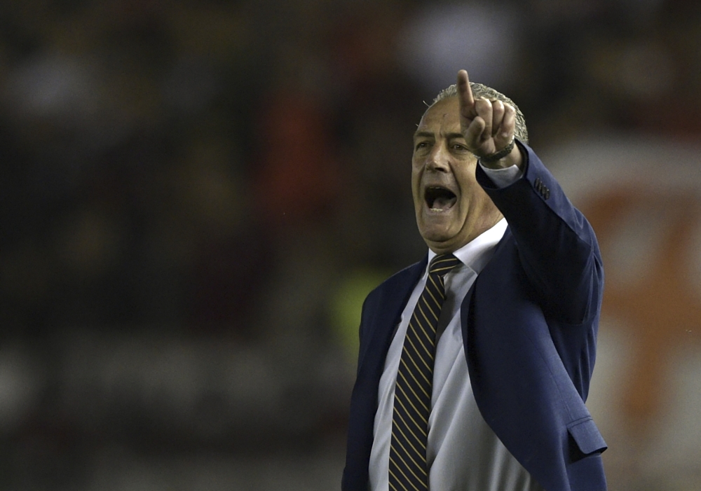 In this file photo taken on October 01, 2019 then Boca Juniors' coach Gustavo Alfaro gives instructions during the all-Argentine Copa Libertadores semifinal first leg football match against River Plate at the Monumental stadium in Buenos Aires. Argentinia