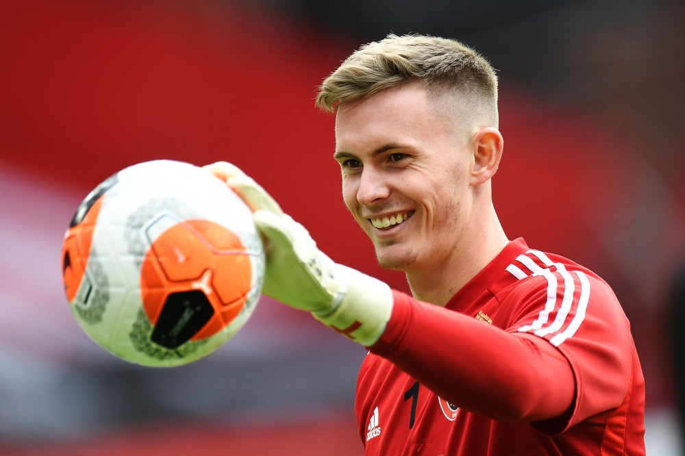 In this file photo taken on July 20, 2020 Sheffield United's English goalkeeper Dean Henderson warms up prior to the English Premier League football match between Sheffield United and Everton at Bramall Lane stadium in Sheffield, northern England. AFP / P