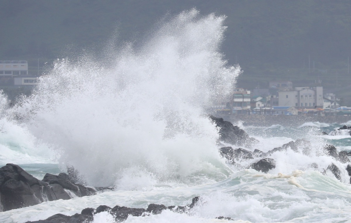 High waves batter the coastline in Seogwipo on the southern island of Jeju on August 25, 2020, as Typhoon Bavi approaches South Korea. Local reports said Typhoon Bavi was predicted to pass along the western coast of South Korea and make landfall in North 