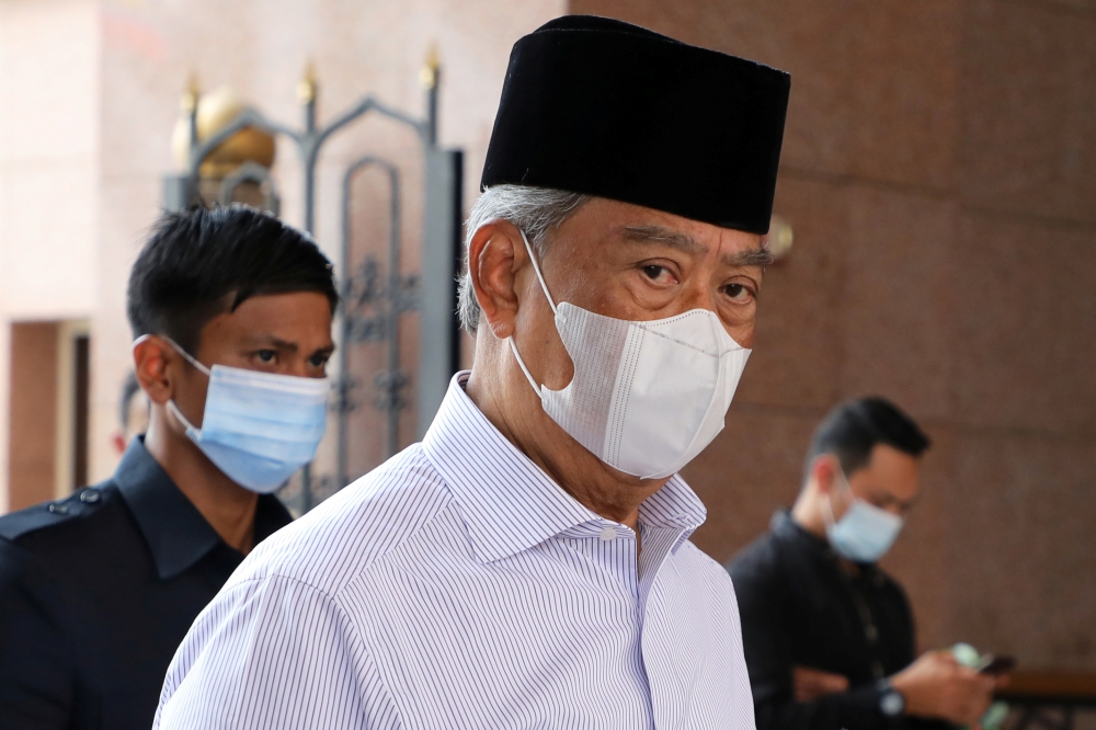Malaysia's Prime Minister Muhyiddin Yassin wearing a protective mask arrives at a mosque for prayers, amid the coronavirus disease (COVID-19) outbreak in Putrajaya, Malaysia August 28, 2020. REUTERS/Lim Huey Teng