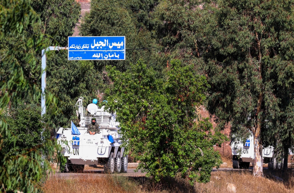 United Nations peacekeeping force (UNIFIL) patrol near the village of Mais el Jabal, along the southern Lebanese border with Israel on August 26, 2020. AFP / Mahmoud ZAYYAT
