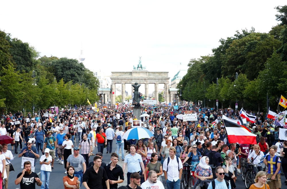 Demonstrators attend a rally against the government's restrictions following the coronavirus disease (COVID-19) outbreak, in Berlin, Germany August 29, 2020. REUTERS/Axel Schmidt