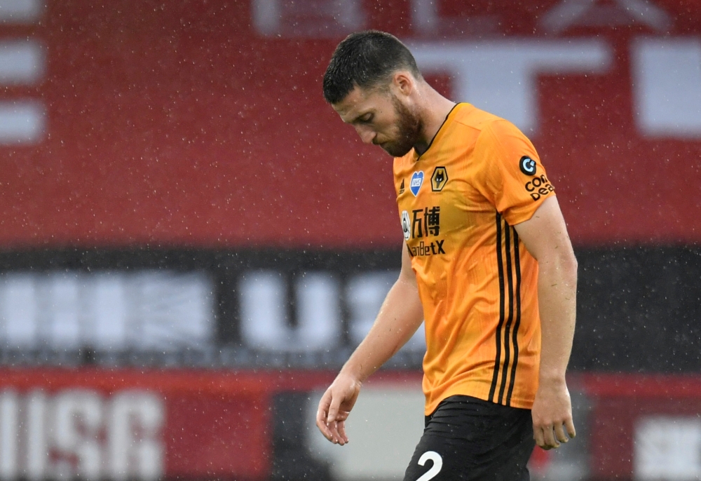 July 8, 2020 Wolverhampton Wanderers' Matt Doherty looks dejected after the match, as play resumes behind closed doors following the outbreak of the coronavirus disease (COVID-19) Peter Powell/Pool via REUTERS